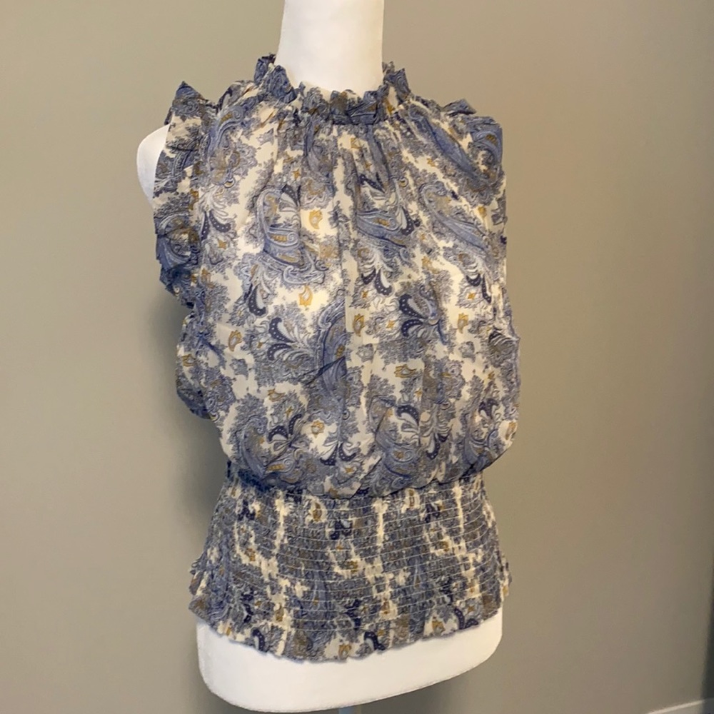 Elegant light sleeveless summer top, never wore.
